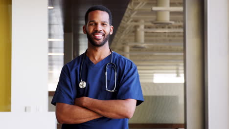 Young-Black-male-doctor-wearing-scrubs