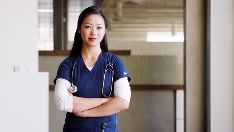 Young-Asian-female-doctor-wearing-scrubs