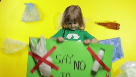 Girl-activist-holding-green-poster-Say-no-to-Plastic.-Plastic-nature-pollution