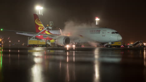 Timelapse-of-deicing-passenger-airplane-at-night-Sheremetyevo-Airport-Moscow