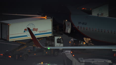 Loading-cargo-into-the-plane-at-night