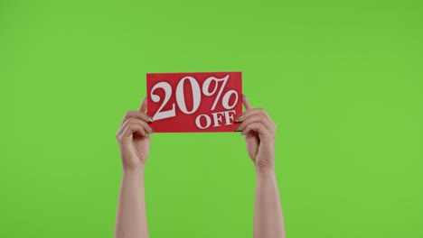 20-Percent-Off-advertisement-inscription-on-paper-sheet-in-womans-hands-on-chroma-key.-Slow-motion