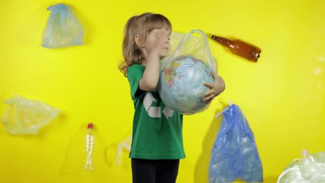 Girl-activist-makes-Earth-globe-free-from-plastic-package.-Reduce-trash-pollution.-Save-ecology