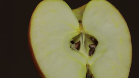Delicious-apple-cut-for-squeezing-fresh-juice.-Apple-half