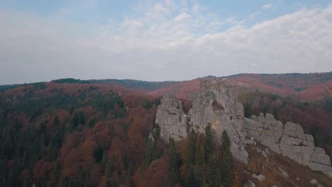Impressive-drone-shot-of-the-mountain-hills-in-forest.-Autumn.-Aerial-view