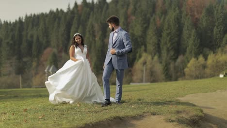 Groom-with-bride-in-the-park.-Wedding-couple.-Happy-family-in-love