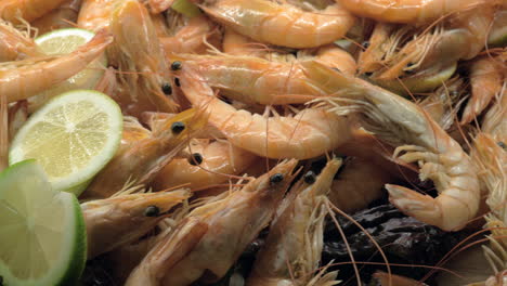 A-closeup-of-cooked-shrimpes-decorated-with-lemon-and-lettuce