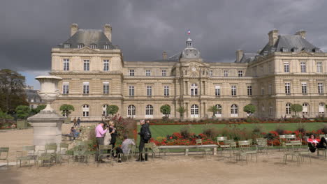 Palace-in-Luxembourg-Gardens-with-visitors-relaxing-outdoor-Paris