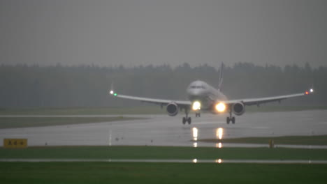Aeroflot-plane-landing-on-wet-runway-in-rainy-weather-Moscow