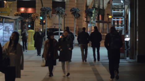 People-walking-in-the-street-of-night-Madrid-Spain