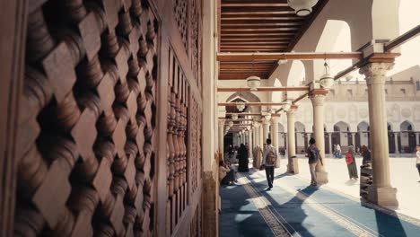 People-strolling-at-Al-Azhar-Mosque-in-Cairo,-Egypt