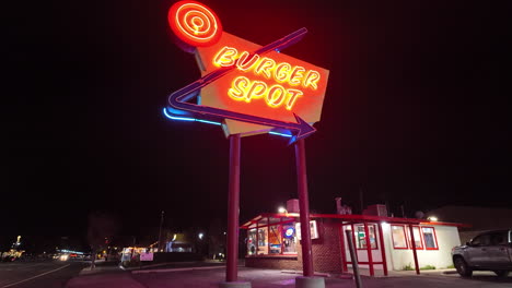 The-bright-neon-sign-for-Burger-Spot-at-nighttime-in-Tehachapi,-California