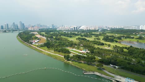 Drone-shot-of-Marina-east-park,-Singapore