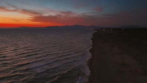 Tuscany-sandy-beach-waves-by-sunset