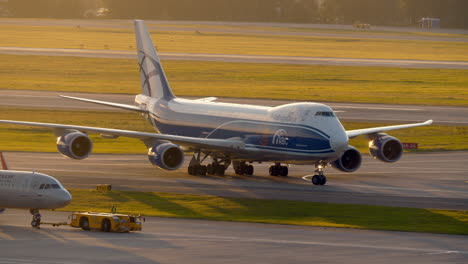 Plane-pushback-and-taxiing-cargo-Boeing-747