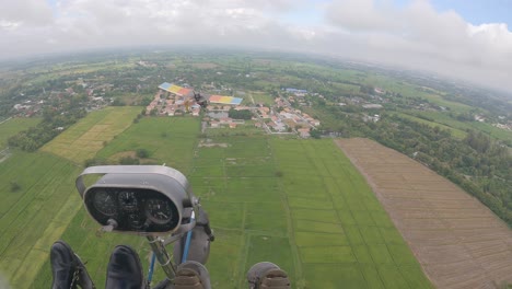 POV-from-cockpit-of-ultralight-aircraft-gliding-from-left-to-right