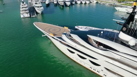A-sleek-luxury-yacht,-symbolizing-opulence,-graces-the-marina-at-the-Miami-Boat-Show