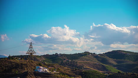 Time-lapse-of-rural-area-power-grid-and-moving-clouds-in-countryside-of-Spain