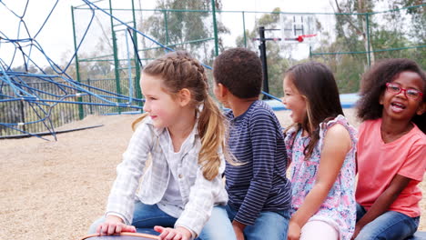 Elementary-school-kids-spinning-in-a-playground
