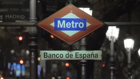 Night-view-of-Banco-de-Espana-metro-sign-in-Madrid-Spain