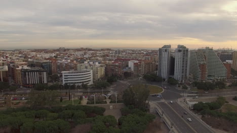 Aerial-shot-of-Valencia-with-Angel-Custodi-Bridge-Turia-Gardens-and-buildings