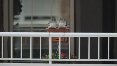 Drying-trainers-on-the-balcony