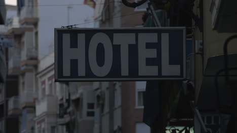 Blue-hotel-sign-with-white-letters