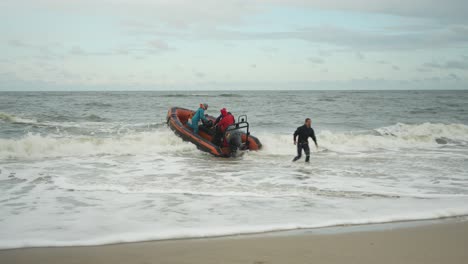 Rescue-boat-launching-from-sandy-beach