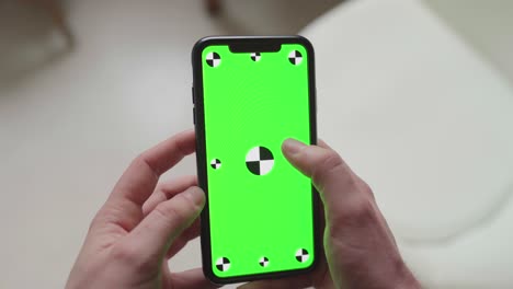 touch-gestures-using-fingers-on-smartphone-with-green-screen-display-with-tracking-markers,-portrait-orientation