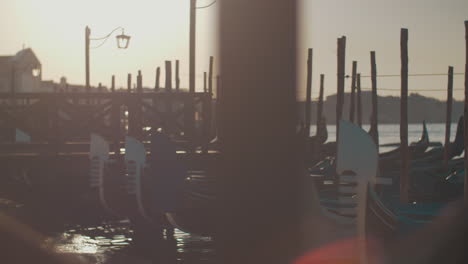 Venice-scene-with-gondolas-mooring-Italy
