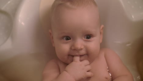 Happy-baby-girl-bathing