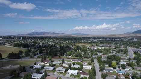 Aerial-view-over-Lewistown-city-neighborhood-area-and-mountains-in-background