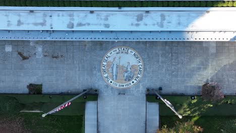 Aerial-view-of-the-Great-Seal-of-the-State-of-North-Carolina-at-state-capitol-building-in-Raleigh