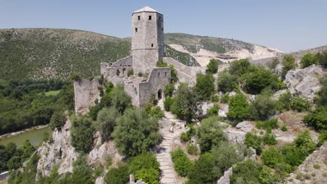 Medieval-tower-of-ancient-castel-built-in-mountain,-citadel-balkan-city-Pocitelj