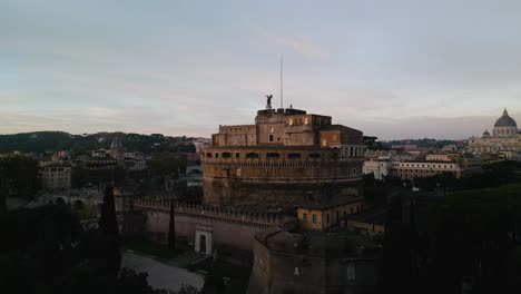 Aerial-Boom-Shot-Reveals-Castel-Sant'Angelo-on-Typical-Morning-in-Rome,-Italy