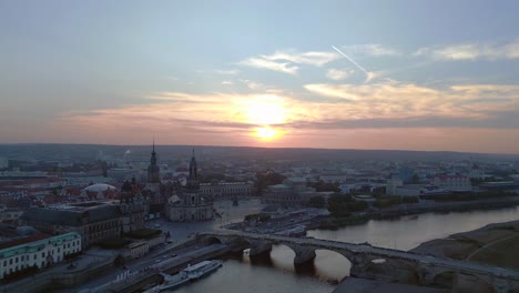 Lovely-aerial-top-view-flight-Sunset-city-Dresden-Church-Cathedral-Bridge-River