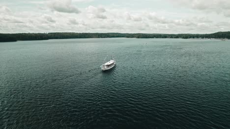 Aerial,-Drone,-old-and-decorated-steamboat-on-a-lake,-Finland,-Paijänne
