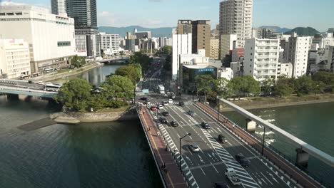Overlooking-Kamiyanagi-Bridge-In-Hiroshima-With-Light-Traffic-Driving-Across-On-Sunny-Day-In-October,-2023