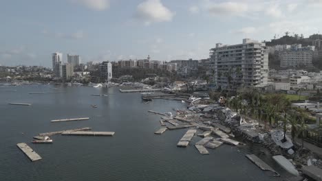 Aerial-shot-of-the-Marina-and-Yacht-Club-in-Acapuclo,-Mexico,-a-few-days-after-Hurricane-Otis