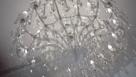 Crystal-Chandelier-Close-Up-with-Sparkling-Lights
