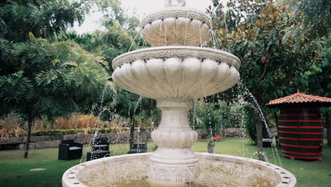Classic-Stone-Fountain-Amidst-Verdant-Garden