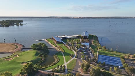 Yarrawonga,-Victoria,-Australia---22-November-2023:-Over-the-golf-course-tennis-courts-and-the-Sebel-Hotel-towards-Lake-Mulwala-beyond
