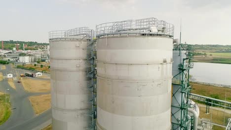 Large-industrial-metal-tanks-for-filter-and-wastewater-treatment-system-of-petrochemical-plant,-oil-and-gas-or-water-in-refinery-or-power-plant
