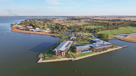 Yarrawonga,-Victoria,-Australia---22-November-2023:-Aerial-of-the-Sebel-Hotel-Yarrawonga-surrounded-by-the-golf-course-and-residential-area-beyond