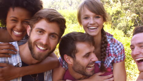 Three-couples-having-fun-outdoors,day,-close-up