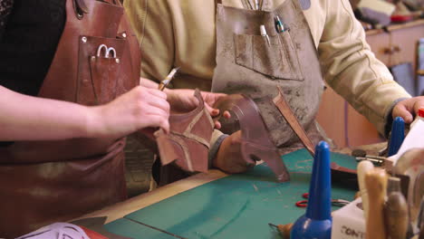 Apprentice-In-Bespoke-Shoemaker-Glueing-Together-Leather