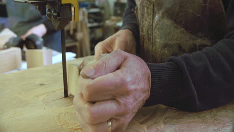 Bespoke-Shoemaker-Shaping-Wooden-Last-For-Shoe-Using-Jigsaw