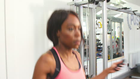 Young-African-American-woman-skipping-at-a-gym