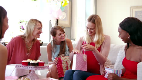 Female-Friends-Meeting-For-Baby-Shower-Shot-On-R3D