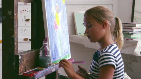 Young-Girl-Working-On-Painting-In-Studio-Shot-On-R3D-Camera